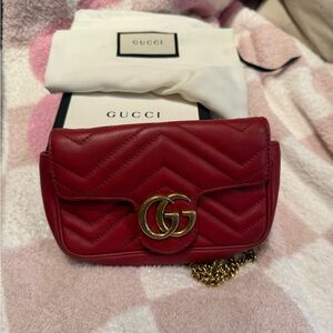 Gucci GG Marmont Matelasse Leather Super Mini Crossbody Bag in Hibiscus Red